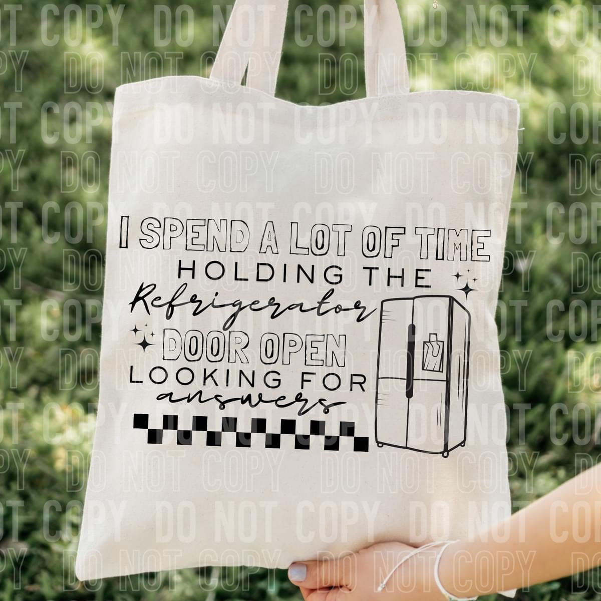 I spend a lot of time holding the refrigerator door open, looking for answers tote bag